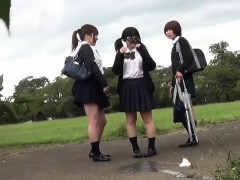 Asian teens pee outdoors